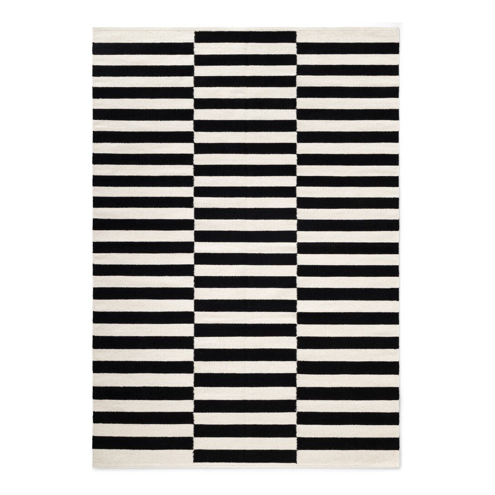 Fekete-fehér kétoldalas kézi szövésű gyapjú szőnyeg 160x230 cm Donna – Hanse Home