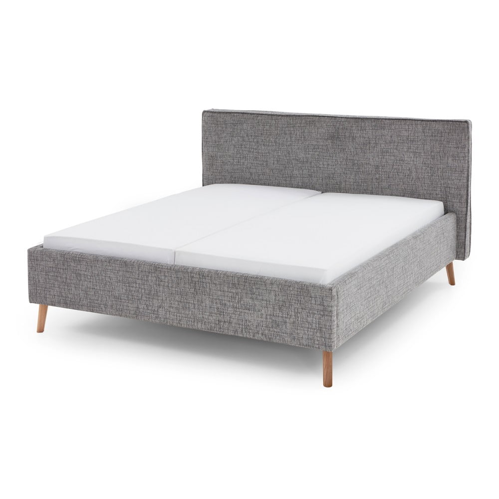 Szürke kárpitozott franciaágy tárolóhellyel